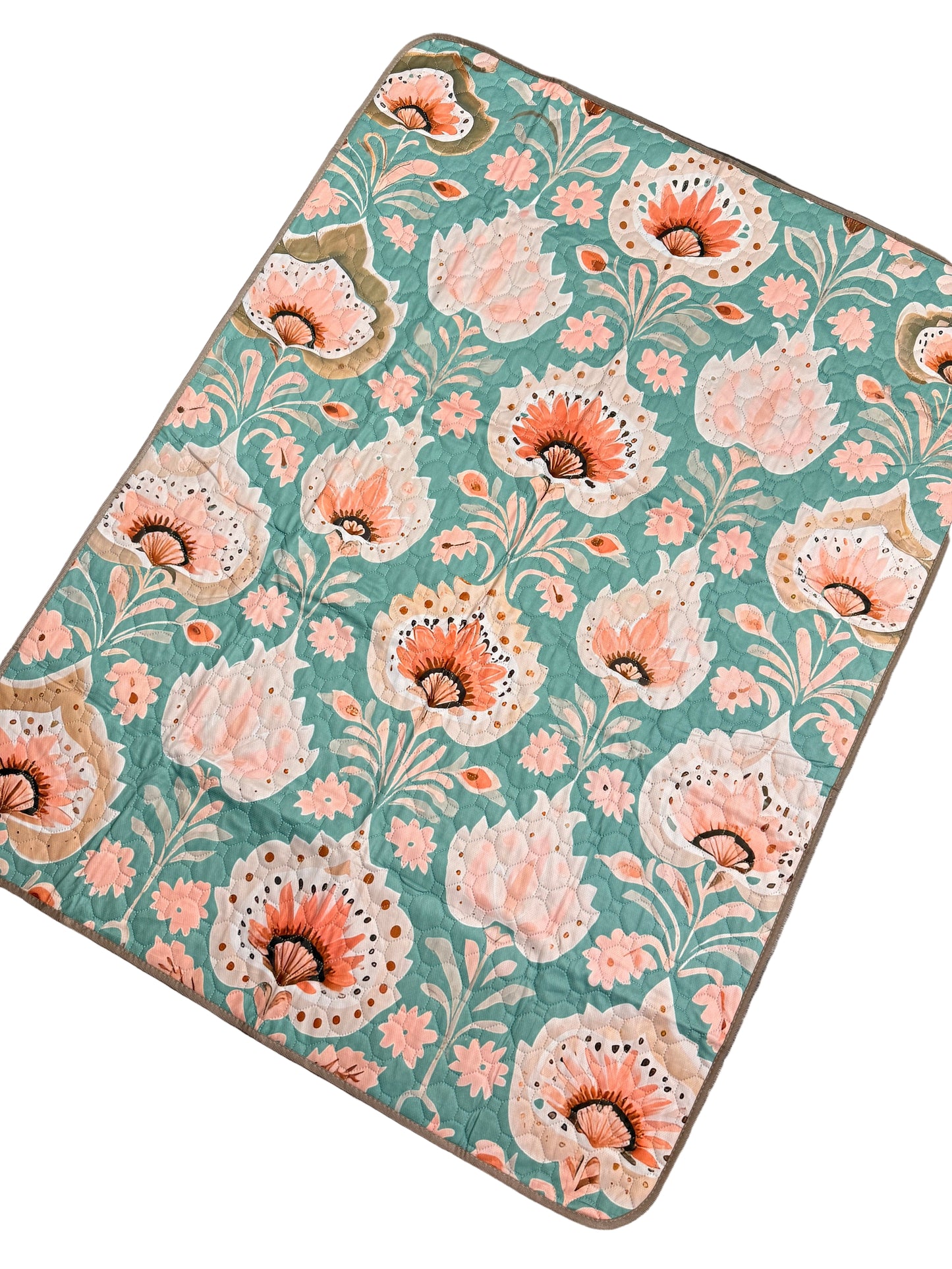 Floral patterned rug on a wooden floor
